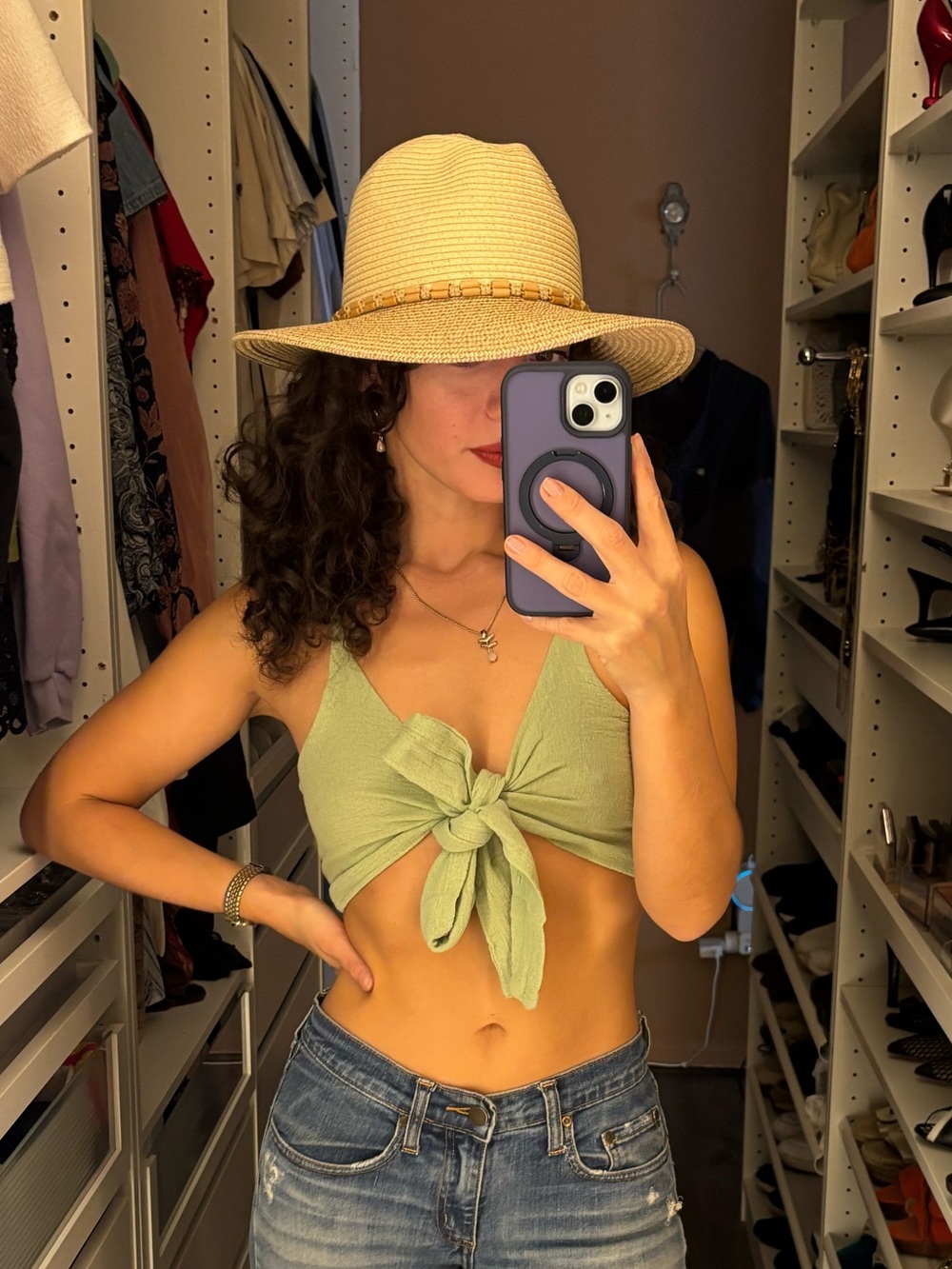 Tan straw hat with bamboo bead trim and tassels